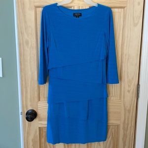 Tahari layers dress above knee.  Great condition
